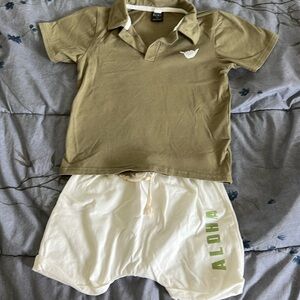 Modern Keiki boutique set. Green collared shirt with cream shorts.